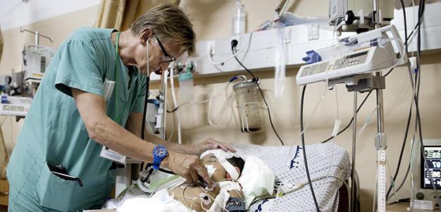 Dr. Mads Gilbert and patient
