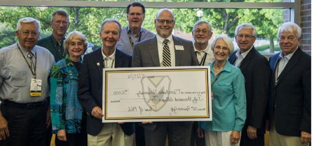 Manchester Class of 1966 presents $50,000 check to President Dave McFadden